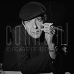 11-12-1985 Leonard Cohen in Rotterdam, The Netherlands. December 11, 1985.

[keywords]Posed, Headshot, Eye contact, Black & White image, Smoking[/keywords]